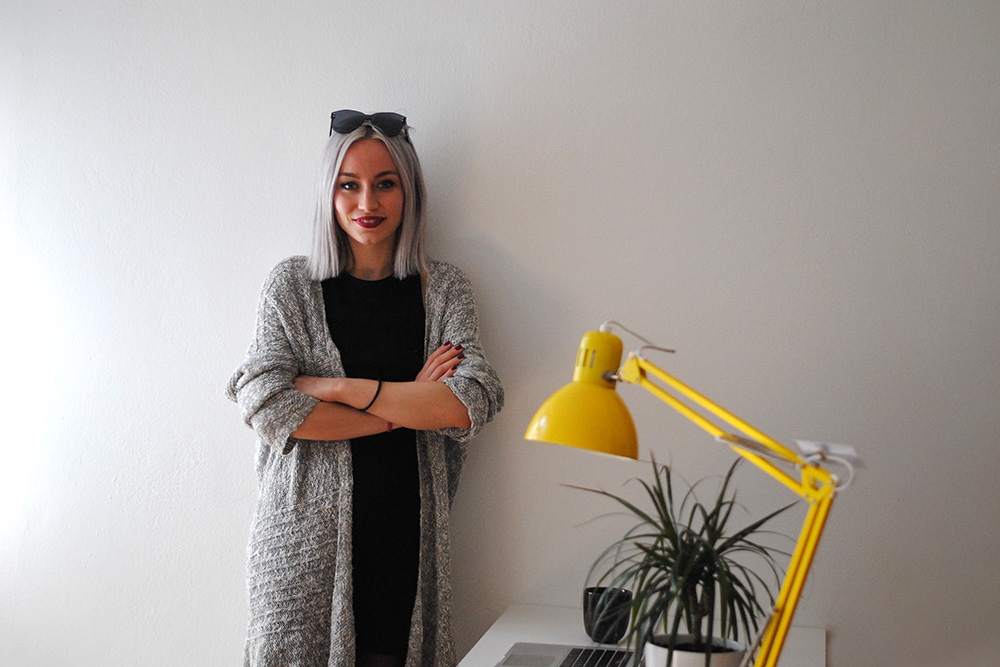 eyerim office tour, creative office, Andrea the creative director wearing Max&Co Sunglasses in Black