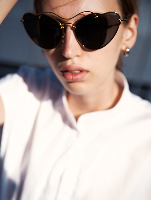 Cat-eye Miu Miu Sunglasses in Gold Frame Colour with Grey Lenses for Women.