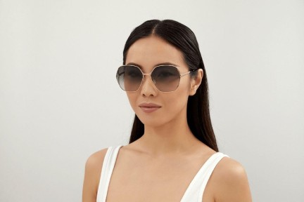 Okulary przeciwsłoneczne Gucci GG0818SA 001 Oversize Złote